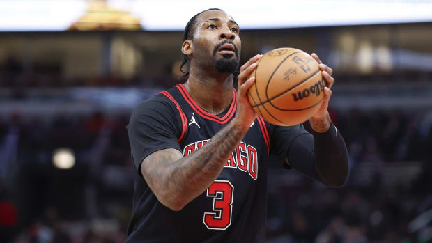 Dec 30, 2023; Chicago, Illinois, USA; Chicago Bulls center Andre Drummond (3) shots a free throw against the Philadelphia 76ers during the first half at United Center. Mandatory Credit: Kamil Krzaczynski-USA TODAY Sports